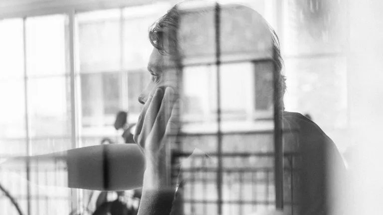 A man sitting at table.