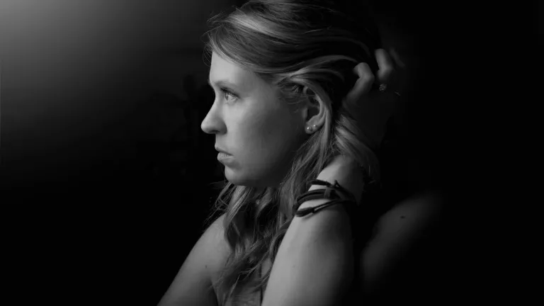A woman looking away from the camera.
