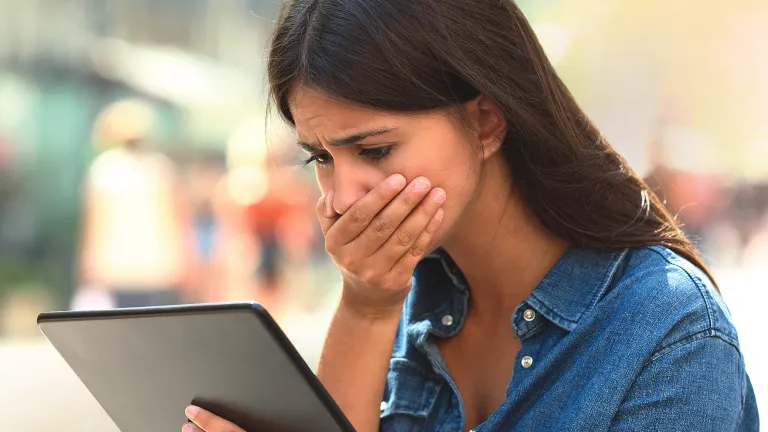 Fear is a common reaction in the face of a pandemic outbreak —fear of the unknown, fear of where this could lead. A woman reading a tablet
