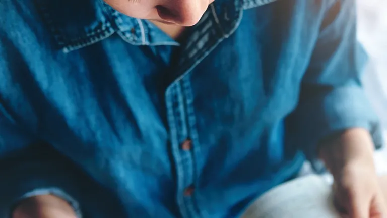 A woman reading a book.
