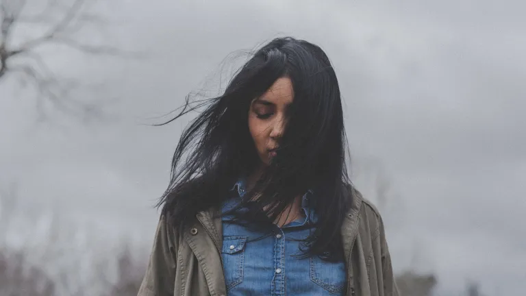 Life won’t be free of difficulties, and stressors, but God desires that we build a relationship with Him to anchor us in the difficult times. A woman walking alone.