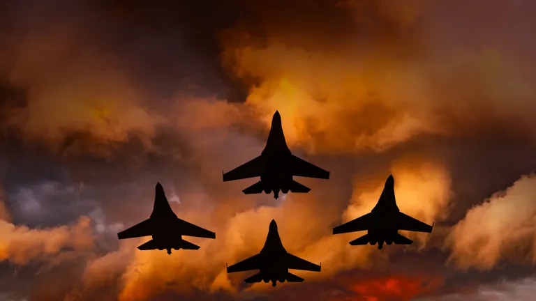 Jets flying low in dark clouds.