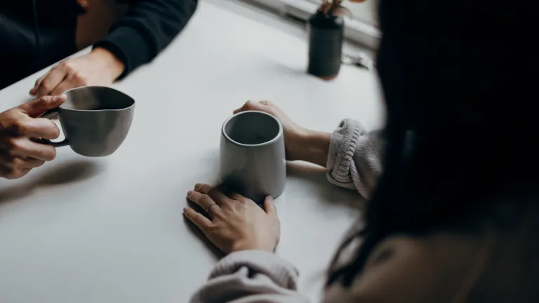 When it comes to get-togethers like Thanksgiving dinner, some controversial topics may very well come up, and we should have a plan in advance for dealing with it. Two people talking over coffee