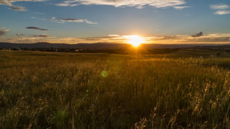 Christ kept the Sabbath Holy all His life, and He was an example for us. A sunset over a field.