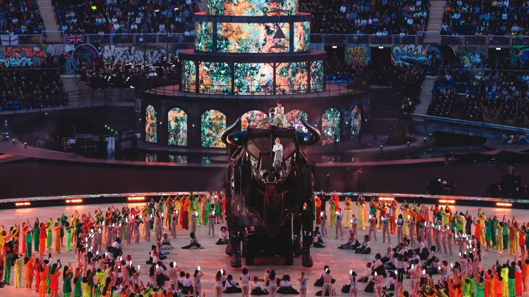 The opening ceremony of the 2022 Commonwealth Games featured crowds “worshiping” a frightening beast in front of a stylized structure resembling the Tower of Babel in imagery drawn from the biblical book of Revelation. The opening ceremony of the 2022 Commonwealth Games featured crowds “worshiping” a frightening beast in front of a stylized structure resembling the Tower of Babel in imagery drawn from the biblical book of Revelation.
