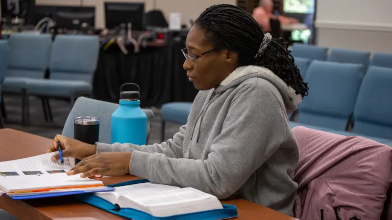 a group of happy students outdoors