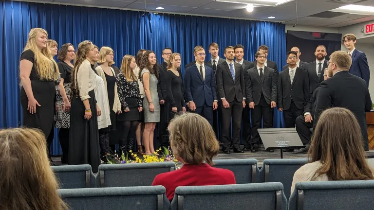 a choir standing onstage