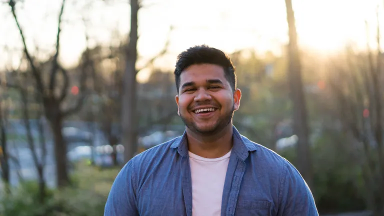 With great power comes great responsibility, and men have the responsibility to use their power appropriately and maintain self-control. a man standing outdoors with woods in the background