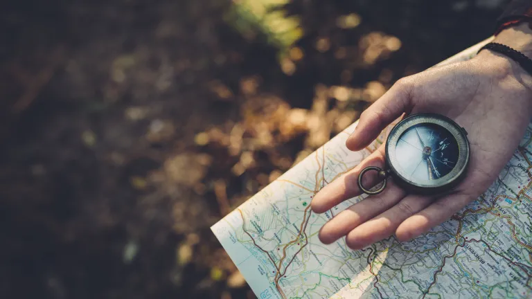 Our Creator has revealed seven annual festivals starting in the spring, each one depicting some great event in the ongoing mapping of God’s salvation for humankind. A person holding a compass and a map.