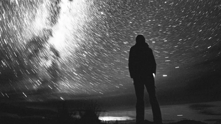 The idea that others can reshape the nature of reality into what they want it to be is false. This twisted imagining leads to calling and believing evil good and good evil. A night sky spinning and distorted.