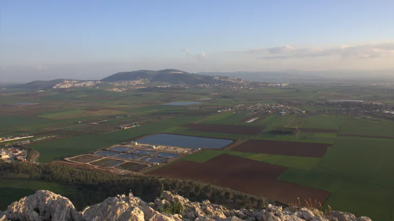 Megiddo overlooked the narrow entrance to Israel's northern mountains from the Plain of Megiddo-also known as the Valley of Esdraelon, or Jezreel-a level expanse some 20 miles long and 14 miles wide. Valley of Jezreel in Israel.