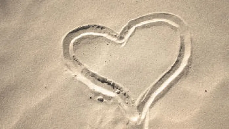 heart drawn in the sand