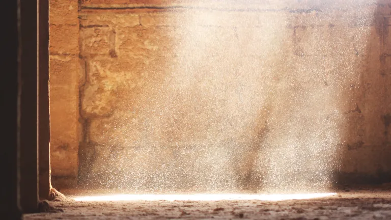 The time is now to read the handwriting on the wall of our time and seek to understand the will of the God of heaven! A an empty room with a brick walls and sunlight coming in from a window.