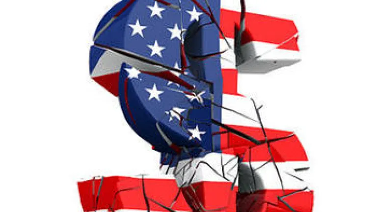 3D image of dollar sign with Unites States that's cracking.