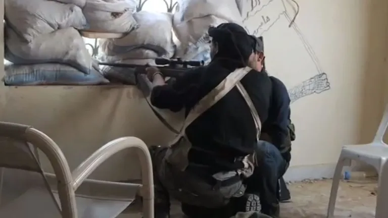 A Syrian rebel sniper in Khan al-Assal, Aleppo province in 2013. A Syrian rebel sniper in Khan al-Assal, Aleppo province in 2013.