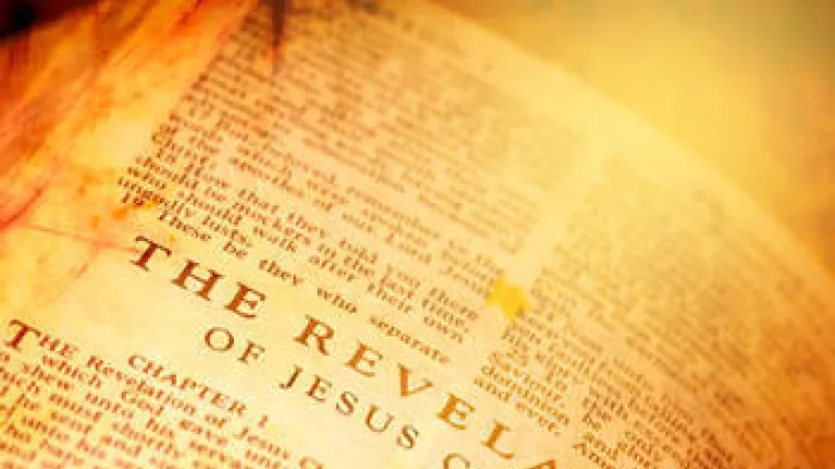 Bible opened to the book of Revelation.