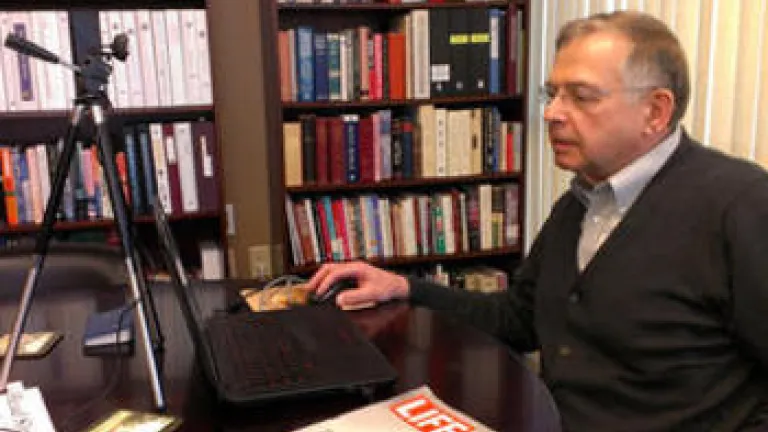 Victor Kubik talking with friends and family in Ukraine.