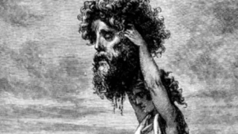 David raising huge head of Goliath with foot on body - King David: Man or Myth?