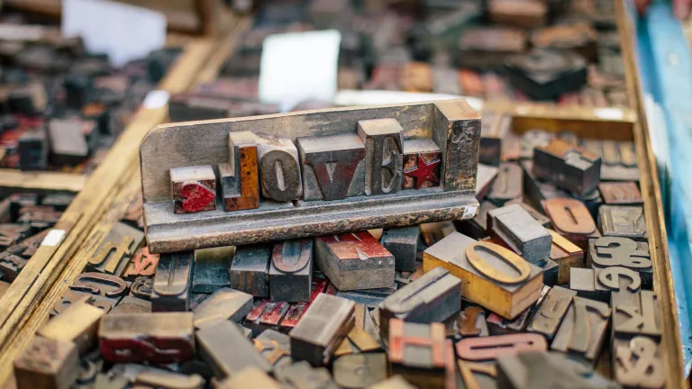 Blocks of letter spelling "love".