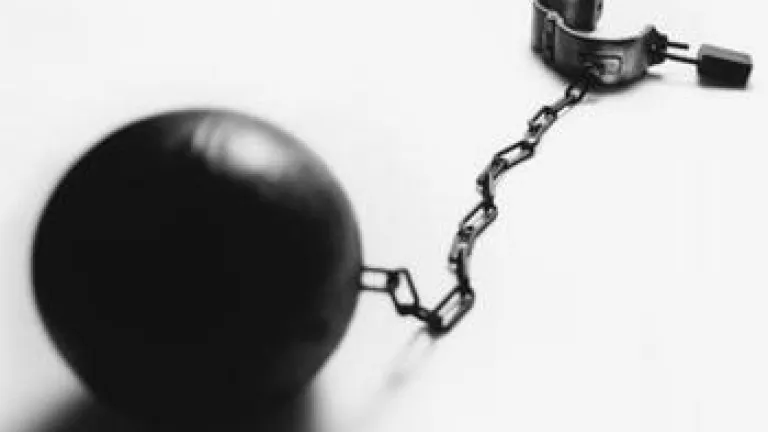 Ball and chain with hand cuff.