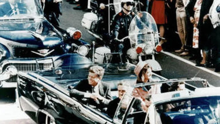 The Kennedy Assassination: An American Turning Point President John F. Kennedy riding in a motorcade in Dallas, Texas.