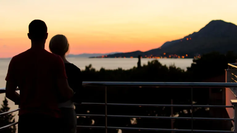 A young couple standing together.