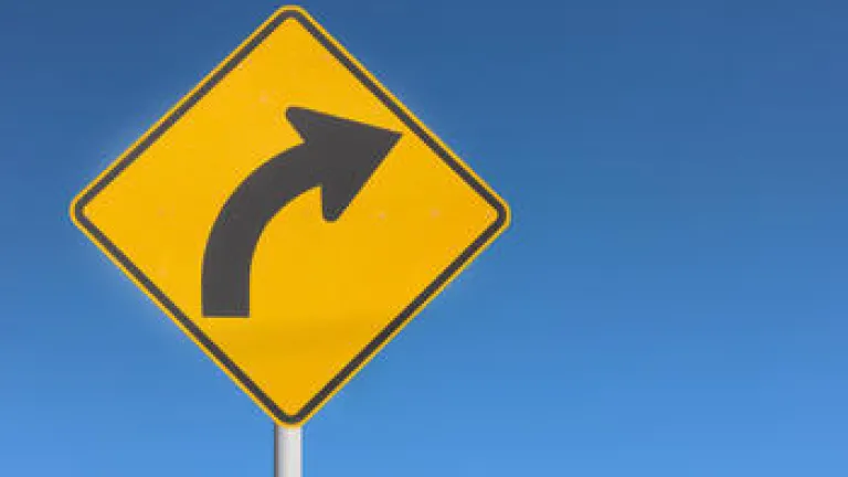 street sign with turn arrow