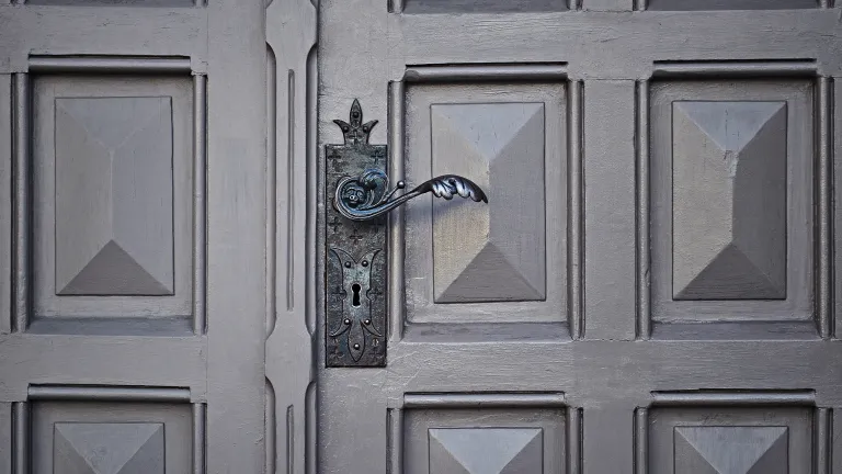 When one came to seek the king’s help or counsel, the servant’s job was to open the door to the king’s house and assist him in reaching the king. Old door with ornate handle and key hole.