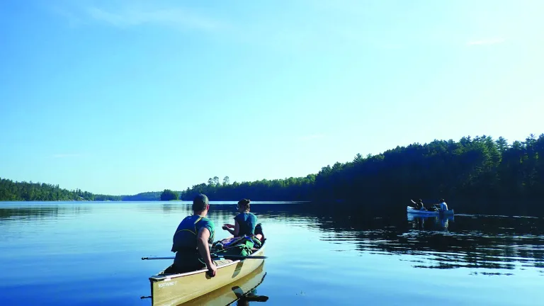 Photo of campers canoeing during the Boundary Waters adventure.