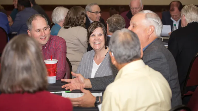 Ron and Janet Barker with others during the roundtable discussions.