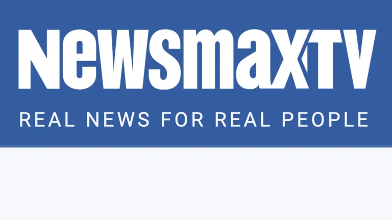 NewsMax TV reaches 70 million households on cable, satellite and broadcast stations, plus streams online at NewsmaxTV.com. This is a graphic of the Newsmax TV logo.