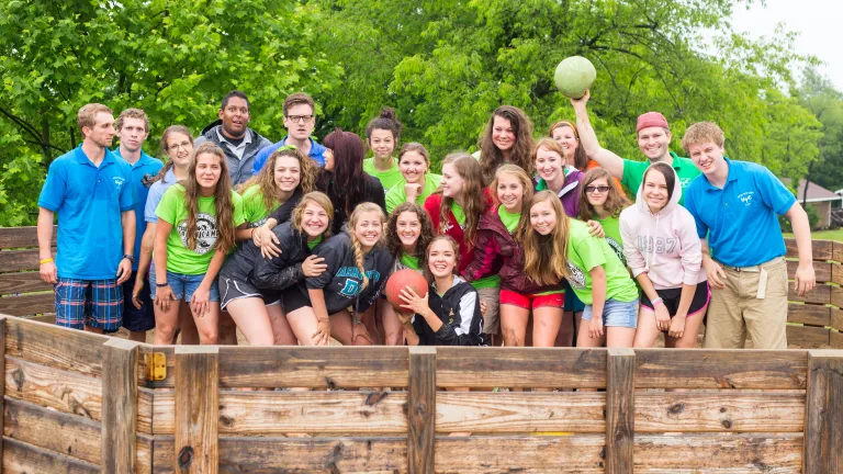 Campers and staff pose for photo at Camp Cotubic.