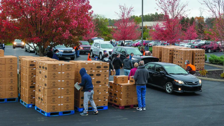 More than 60 people volunteered to assist directing traffic, loading cars and restocking boxes.