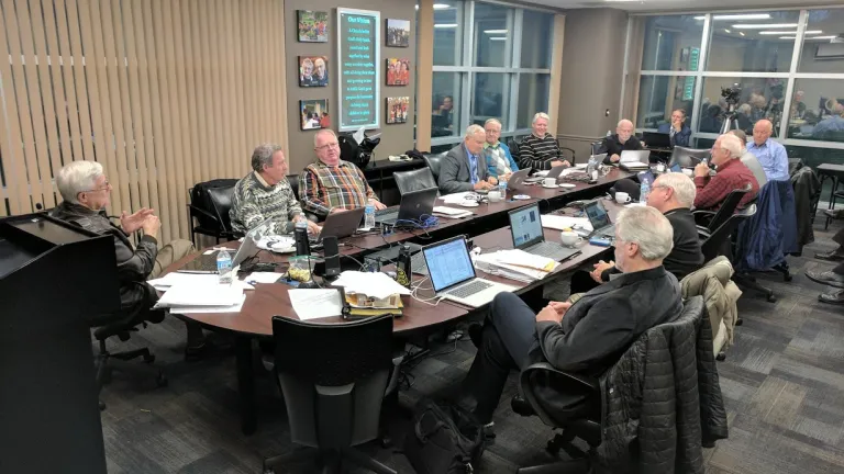 The council of elders meeting at the home office in Ohio.