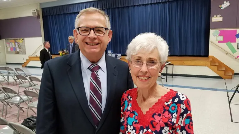 President Victor Kubik and Betty Bost at the Charlotte, North Carolina congregation.