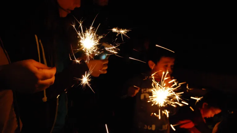 Kids playing with sparklers
