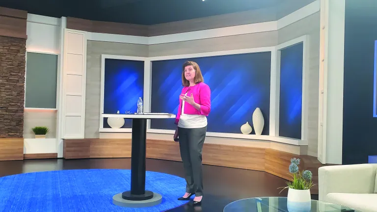 Julie Brown presents an analysis of the results. Photo of Julie Brown presenting an analysis of the results.