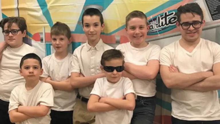 Boys from New England dress as greasers for the dance social on Feb. 1.