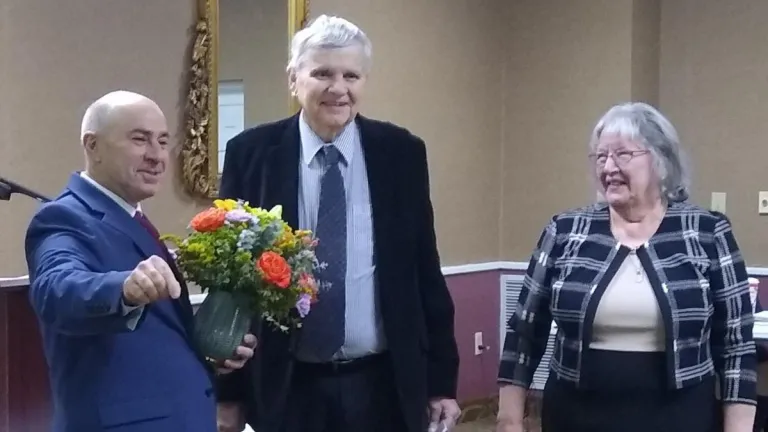 Mark Welch makes a presentation honoring Mike and Rita Arritt at services in Roanoke, Virginia.