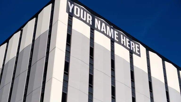 a photo of a building with a blank space for your name.