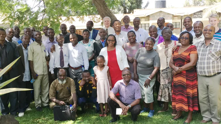 John Elliott with Church members in East Africa.