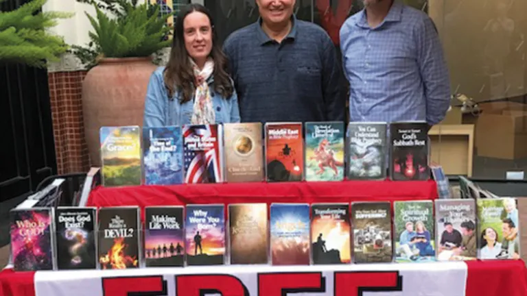Jennifer Heesch, Mario Seiglie and Bill Carter at the newsstand at Irvine Spectrum Mall.