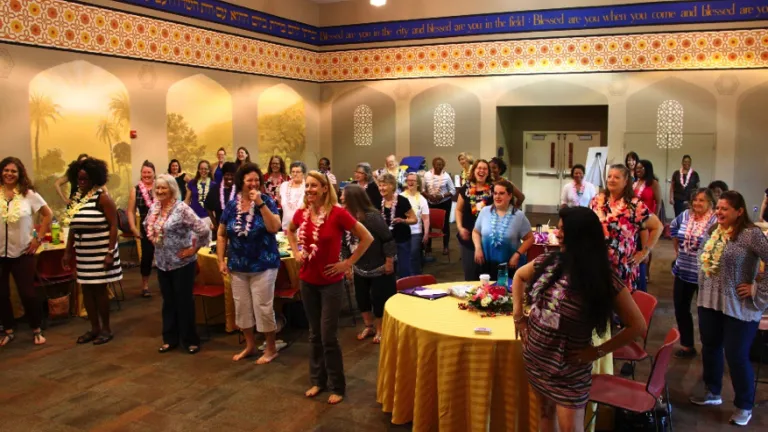 Women learning to hoola dance at the Mid-Atlantic Women’s Enrichment Weekend in Reisterstown, Maryland.