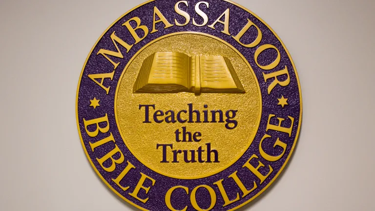 The Ambassador Bible College seal at the entry way.
