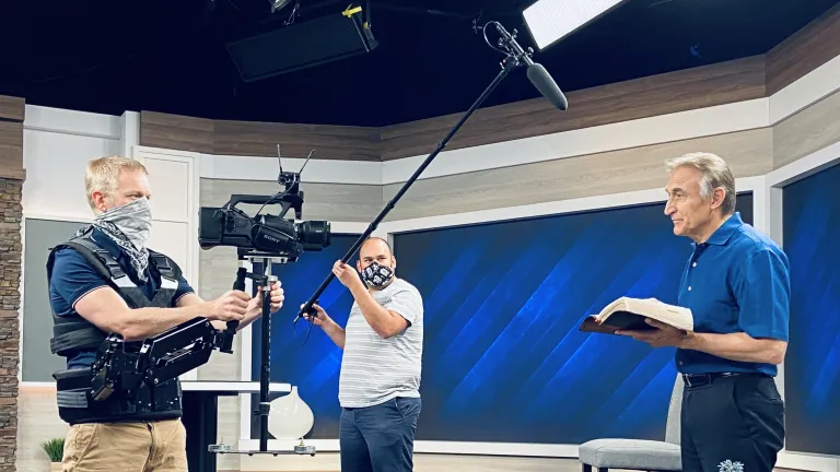 Beyond Today media staff wearing masks as they record Steve Myers presenting a BT Daily.