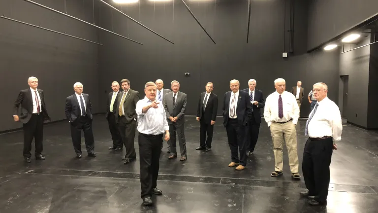 Peter Eddington gives Council of Elders members a tour of the new recording studio space.