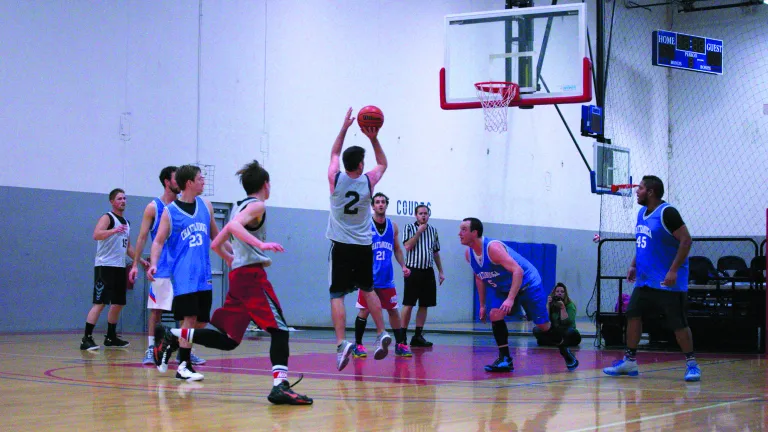 Basketball teams Old School and Chattanooga play in the championship game. Old School won the championship.