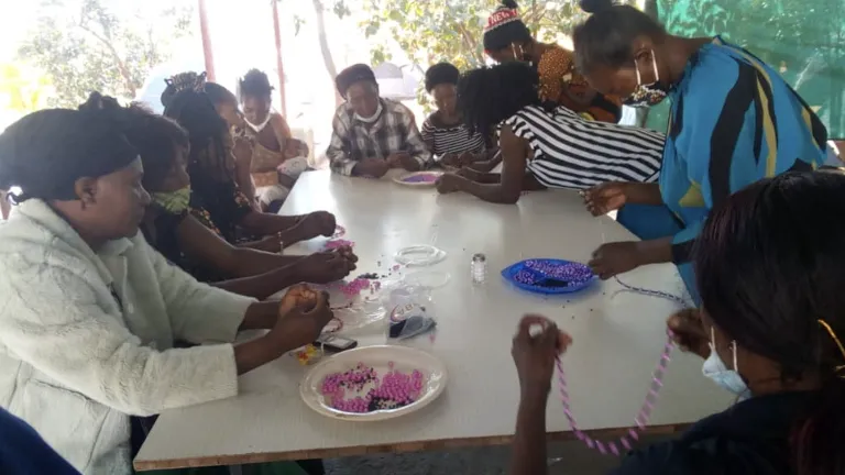 Women learned how to make bead jewelry and doormats at the women’s enrichment weekend in the Copperbelt.