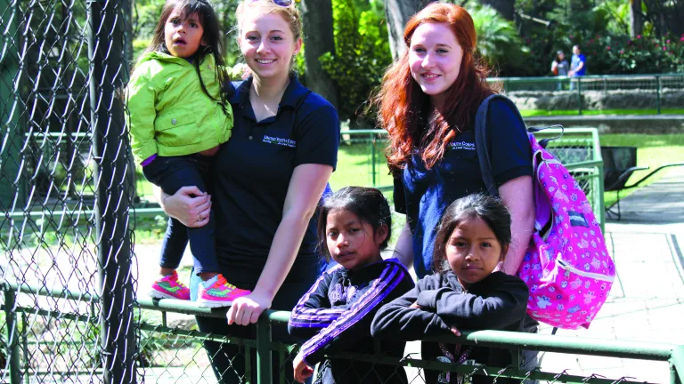 Volunteers and orphans at the Youth Corps project in Guatemala.