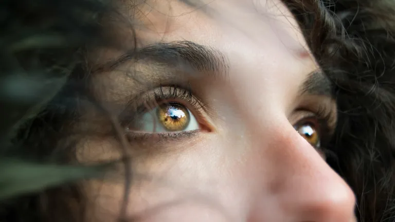 What is your focus? a woman's eyes looking at something in the distance